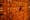 Wall of vintage wooden filing cabinet drawers